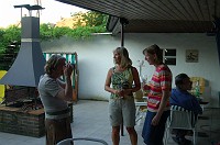  The Müllers had a cookout for us.  That's my friend Ute between Frau Müller and Christiane, and Herr Müller makes an appearance at the table.