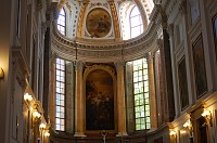  Above the altar.