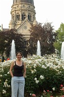  Carolyn posing in front of the roses.