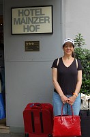  Carolyn posing in front of the three stars.  It was a nice enough hotel.  But that air conditioning unit made it a five-star hotel as far as I was concerned!  In general I took at least two showers a day, if not three.  It was the only way to stay cool and clean.