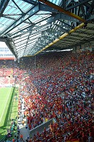  Just a sea of red and yellow of the Spanish fans.  But if you look really hard into the far corner, you'll see some green shirts.  Those are the fans of the Saudi Arabian team.  That's all they could fill up, just that one corner.