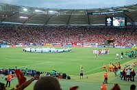  The teams shake hands as the field is cleared.